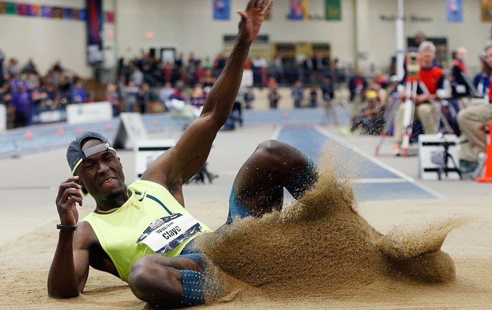 William Claye competes in the men's long jump during the U.S. indoor track and field championships in Boston.