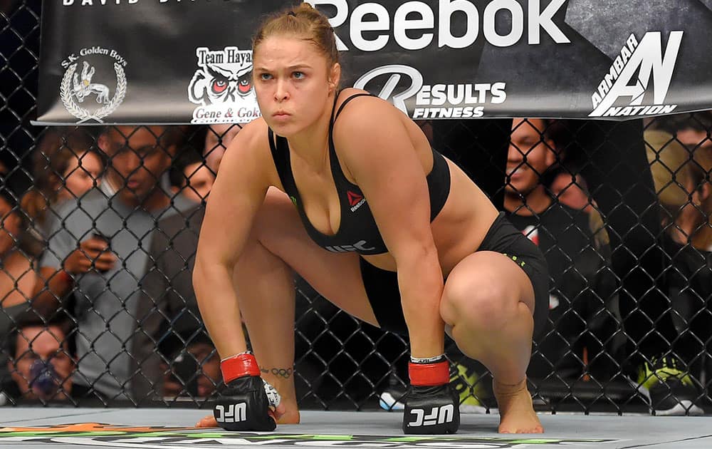 Ronda Rousey gets ready to fight Cat Zingano in a UFC 184 mixed martial arts bantamweight title bout, in Los Angeles. Rousey won after Zingano tapped out 14 seconds into the first round. 