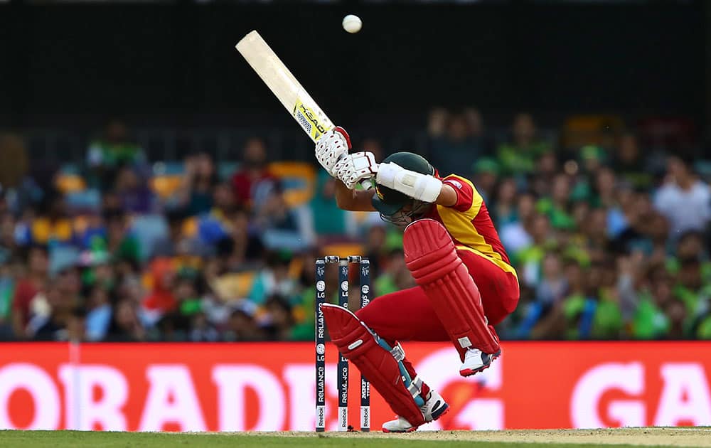 Zimbabwe's Sikandar Raza avoids a bouncer as he bats during the Pool B Cricket World Cup match against Pakistan in Brisbane, Australia.