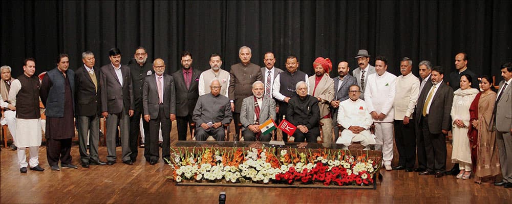 Prime Minister Narendra Modi, Governor of J&K N.N Vohra , Chief Minister Mufti Mohammad Syed, Deputy CM Nirmal Singh and newly appointed Ministers after taking oath,in Jammu.