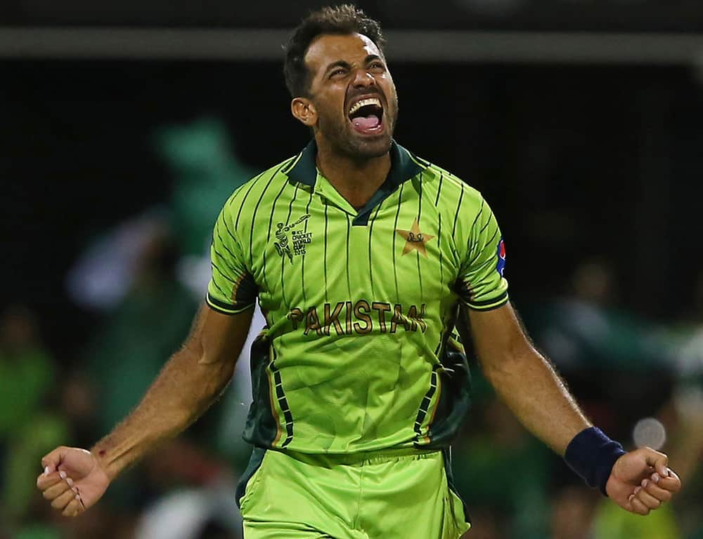 Pakistan's Wahab Riaz, celebrates the wicket of Zimbabwe's Craig Ervine during their Pool B Cricket World Cup match in Brisbane, Australia.