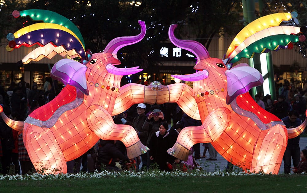 Visitors view elaborate lanterns on the eve of the Lantern Festival in Taipei, Taiwan. The Lantern Festival starts 15 days after the Chinese Lunar New Year and falls on March 4 this year.