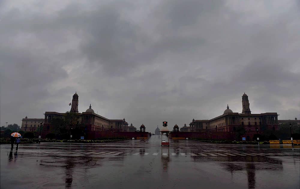 A view of Rajpath as the national capital received early morning showers, in New Delhi.