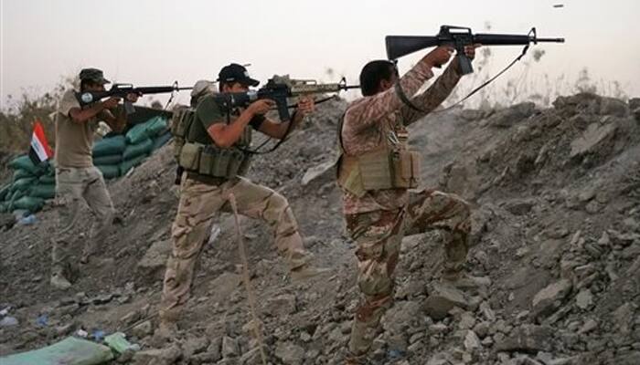 Iraq Army takes on ISIS to retake Saddam Hussein&#039;s hometown Tikrit