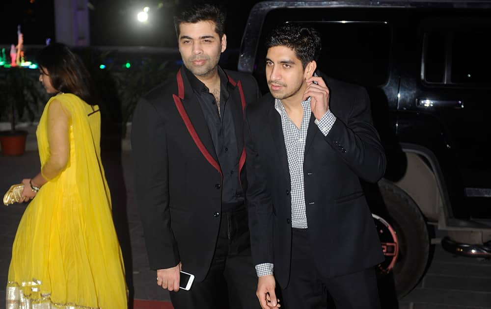 Karan Johar and Ayan Mukerji during the wedding ceremony of Tulsi Kumar and Hitesh in Mumbai. DNA