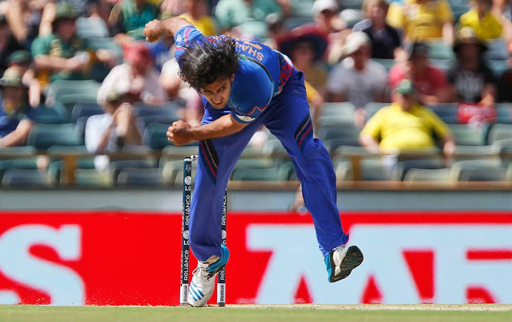 Afghanistan’s Shapoor Zadran bowls during their Cricket World Cup Pool A match against Australia in Perth, Australia.