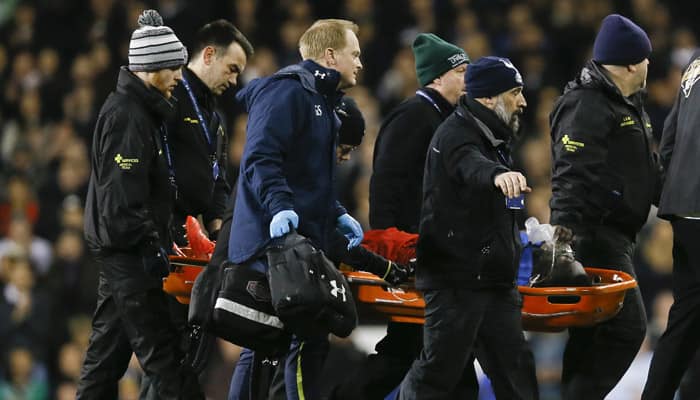 Swansea&#039;s Bafetimbi Gomis taken to hospital after fainting