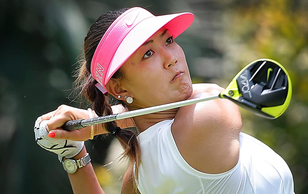 Michelle Wie of the United States tees off on the 12th hole during the first round of the HSBC Women's Champions golf tournament in Singapore. 