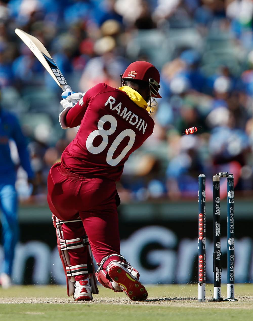 West Indies batsman Denesh Ramdin is bowled for no score during their Cricket World Cup Pool B match against India in Perth, Australia.