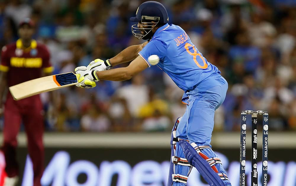 Ravindra Jadeja swings at the ball during their Cricket World Cup Pool B match against the West Indies in Perth, Australia.