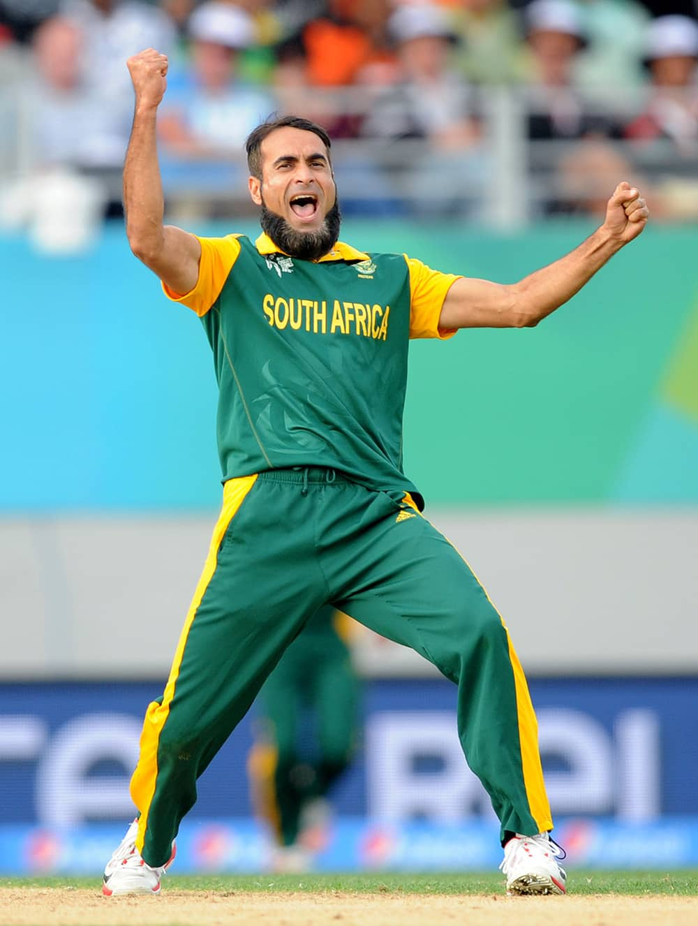 South African bowler Imran Tahir celebrates after taking the wicket of Pakistan batsman Wahab Riaz during their Cricket World Cup Pool B match in Auckland, New Zealand.