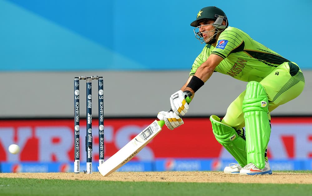 Pakistan's captain Misbah Ul Haq hits the ball while batting against South Africa during their Cricket World Cup Pool B match in Auckland, New Zealand.