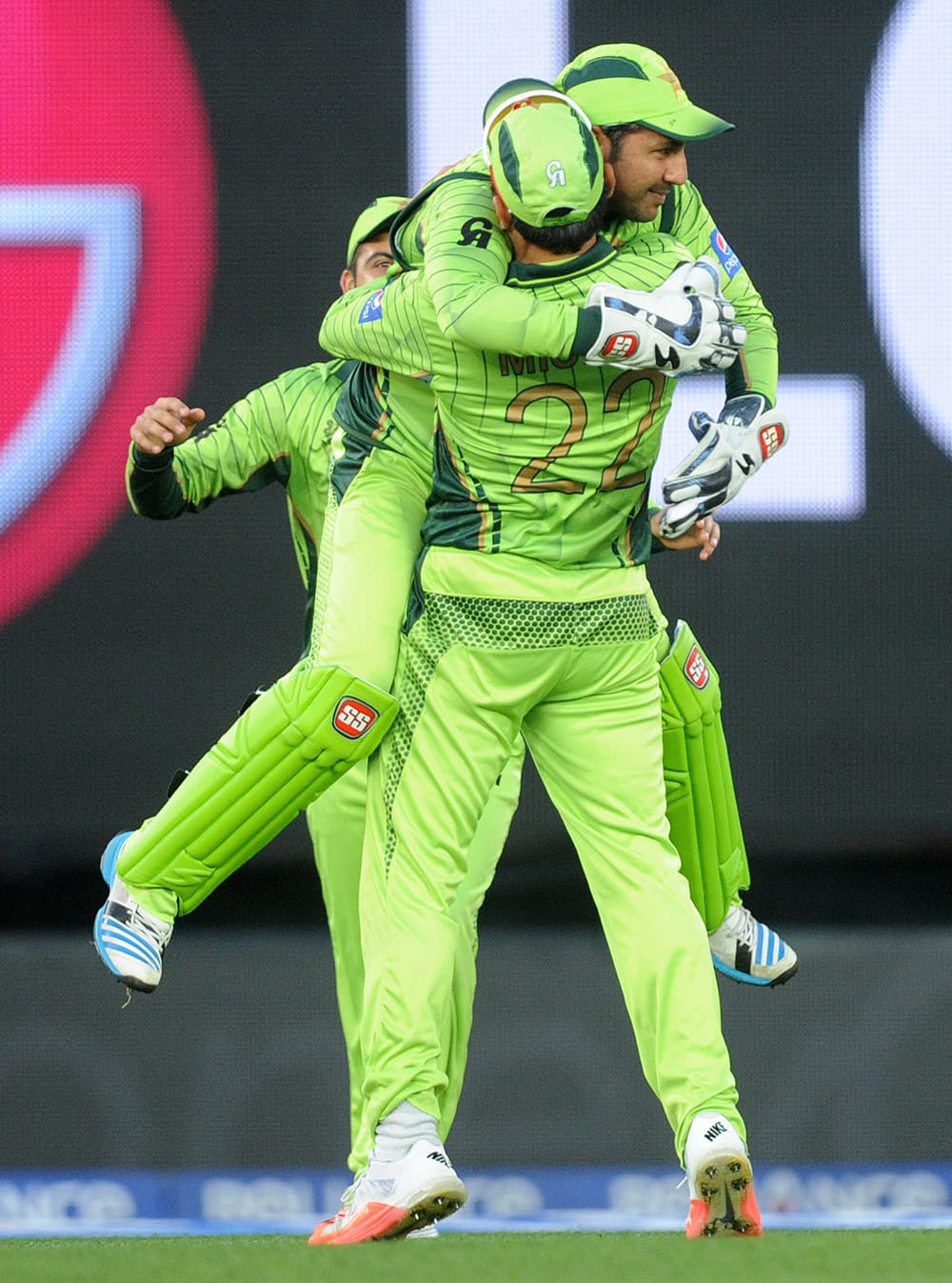 Pakistan's captain Misbah Ul Haq embraces teammate Sarfraz Ahmed after the dismissal of South Africa's Hashim Amla during their Cricket World Cup Pool B match in Auckland, New Zealand.