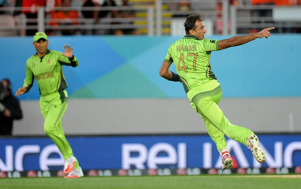 Pakistan bowler Wahab Riaz celebrates after taking the wicket of South Africa's Rilee Rossouw during their Cricket World Cup Pool B match in Auckland, New Zealand.