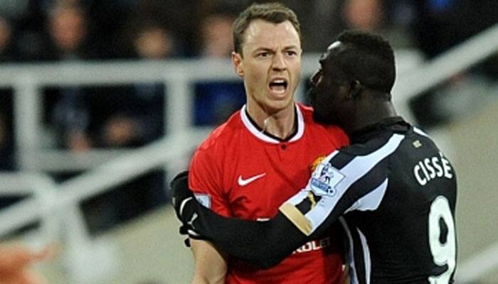 Papiss Cisse, Jonny Evans handed hefty bans for spitting