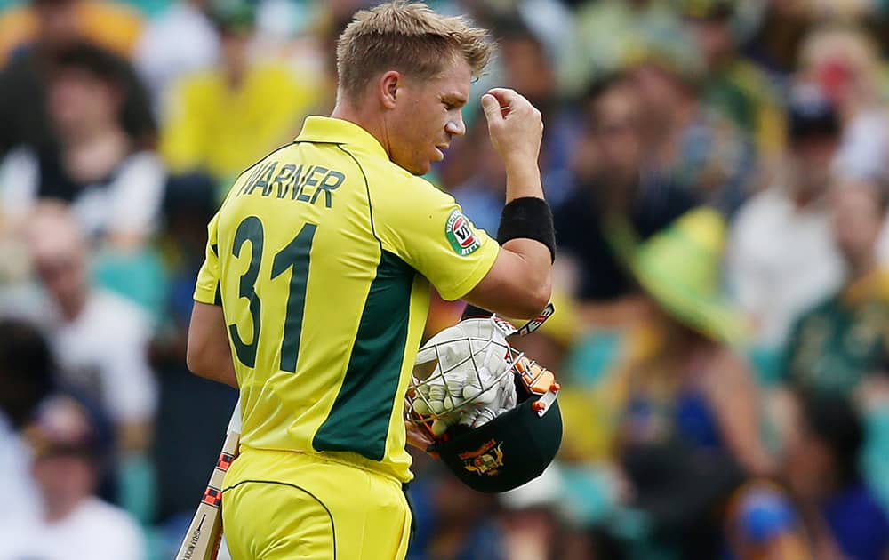 Australia's David Warner walks from the field after he was dismissed for nine runs during their Cricket World Cup Pool A match against Sri Lanka in Sydney, Australia.