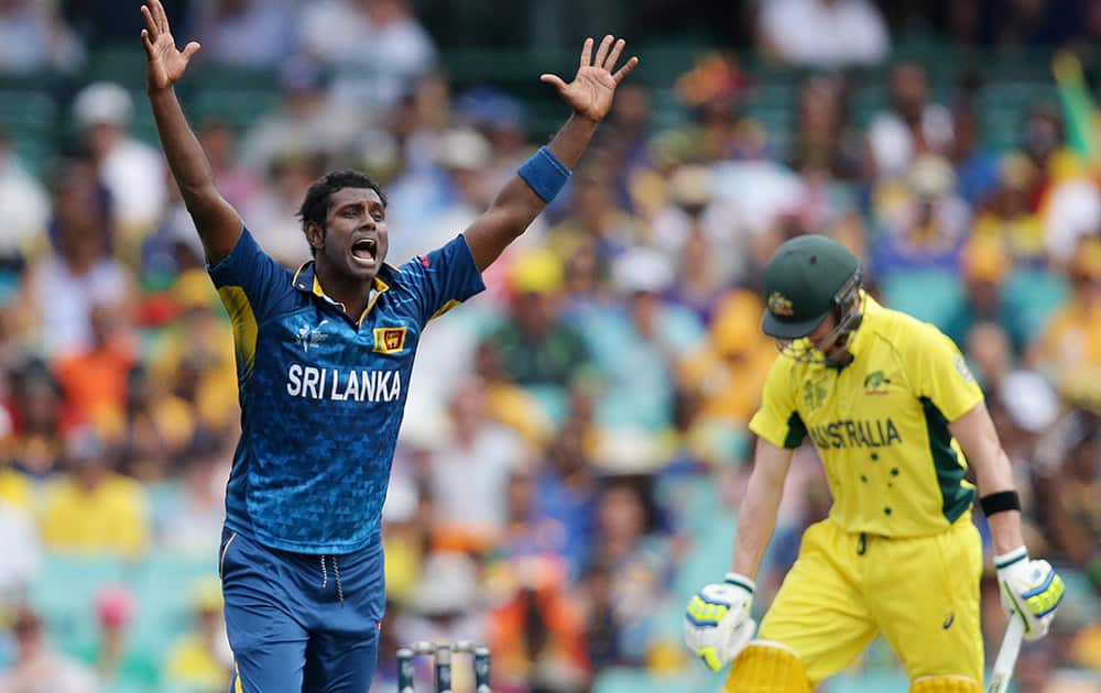 Sri Lanka's Angelo Mathews appeals unsuccessfully for the wicket of Australia's Steve Smith during their Cricket World Cup Pool A match in Sydney, Australia.