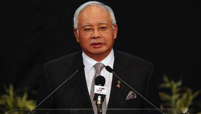 Malaysia PM `hopeful` MH370 will be found, committed to search