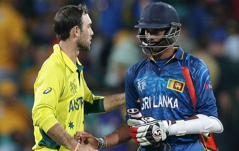 Australia’s Glenn Maxwell, left, greets Sri Lanka’s Sachithra Senanayake after Australia defeated Sri Lanka in their Cricket World Cup Pool A match in Sydney, Australia.