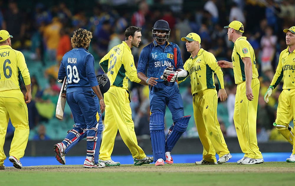 Australia’s Glenn Maxwell, third left, greets teammates after they defeated Sri Lanka in their Cricket World Cup Pool A match in Sydney, Australia.