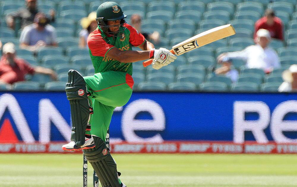 Bangladesh’s Mahmudullah plays at the ball while batting against England during their Cricket World Cup Pool A match in Adelaide, Australia.