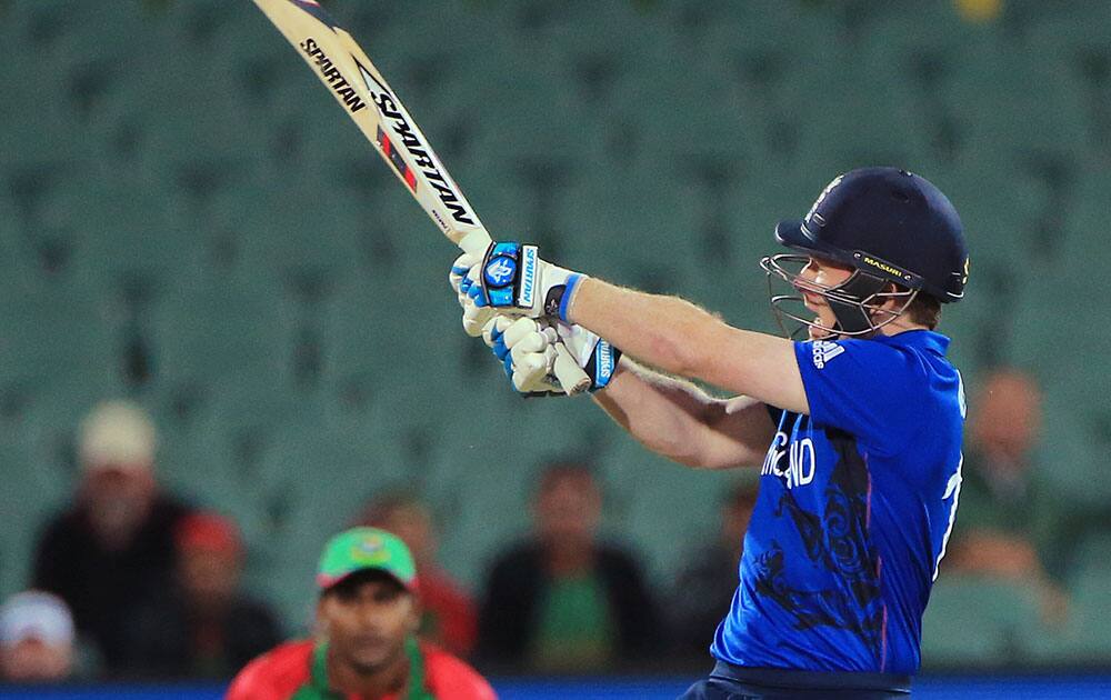 England’s captain Eoin Morgan plays a pull shot during their Cricket World Cup Pool A match against Bangladesh in Adelaide, Australia.