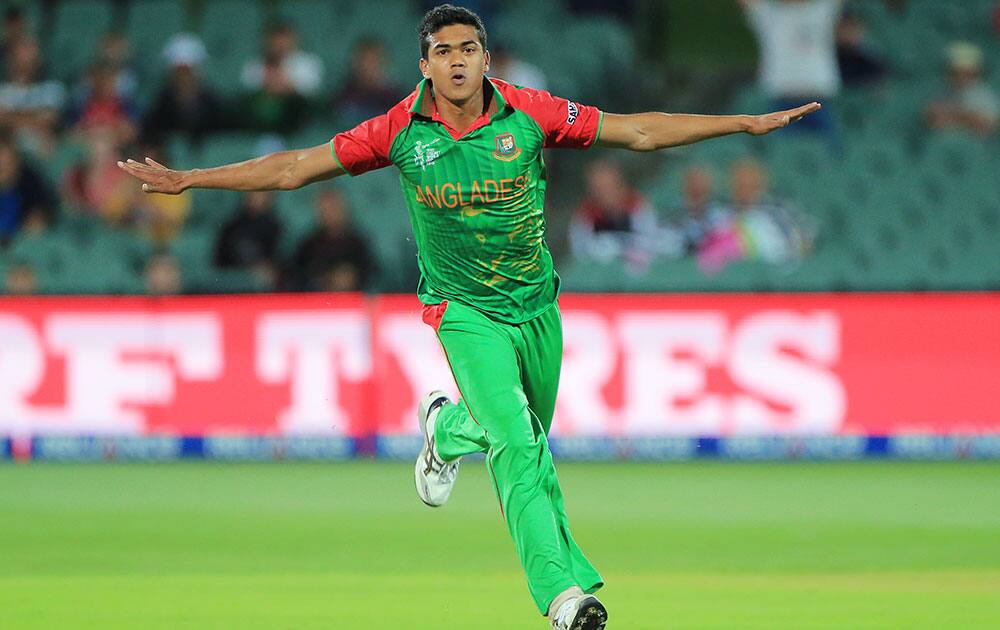 Bangladesh bowler Taskin Ahmed celebrates after dismissing England batsman James Taylor during their Cricket World Cup Pool A match in Adelaide, Australia.