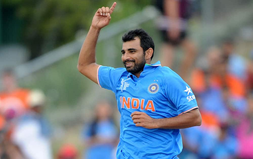 India bowler Mohammed Shami celebrates after taking the wicket of Ireland's Kevin O'Brien during their Cricket World Cup Pool B match in Hamilton, New Zealand.