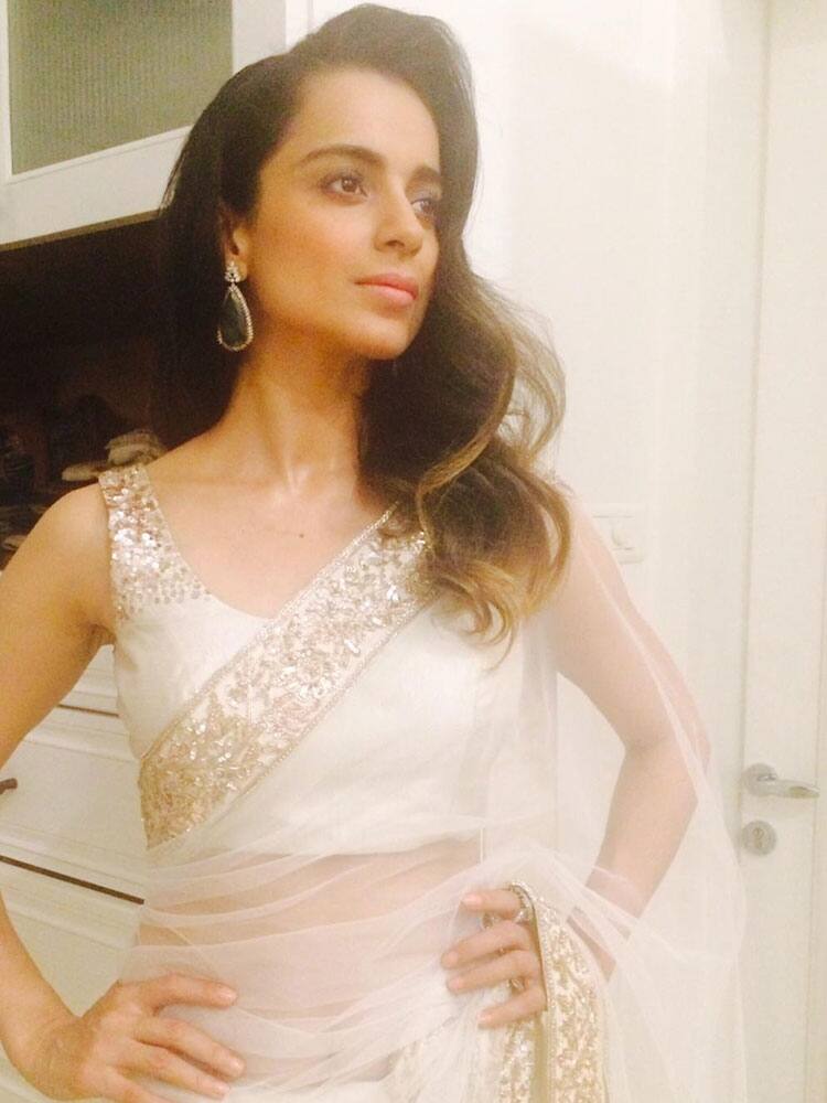 Manish Malhotra :- Very stylish and sensuous Kangana in my white sheer saree -twitter