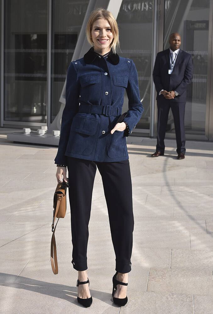 Elena Perminova poses before Louis Vuitton's ready-to-wear fall-winter 2015-2016 fashion collection presented during the Paris fashion week, in Paris, France.