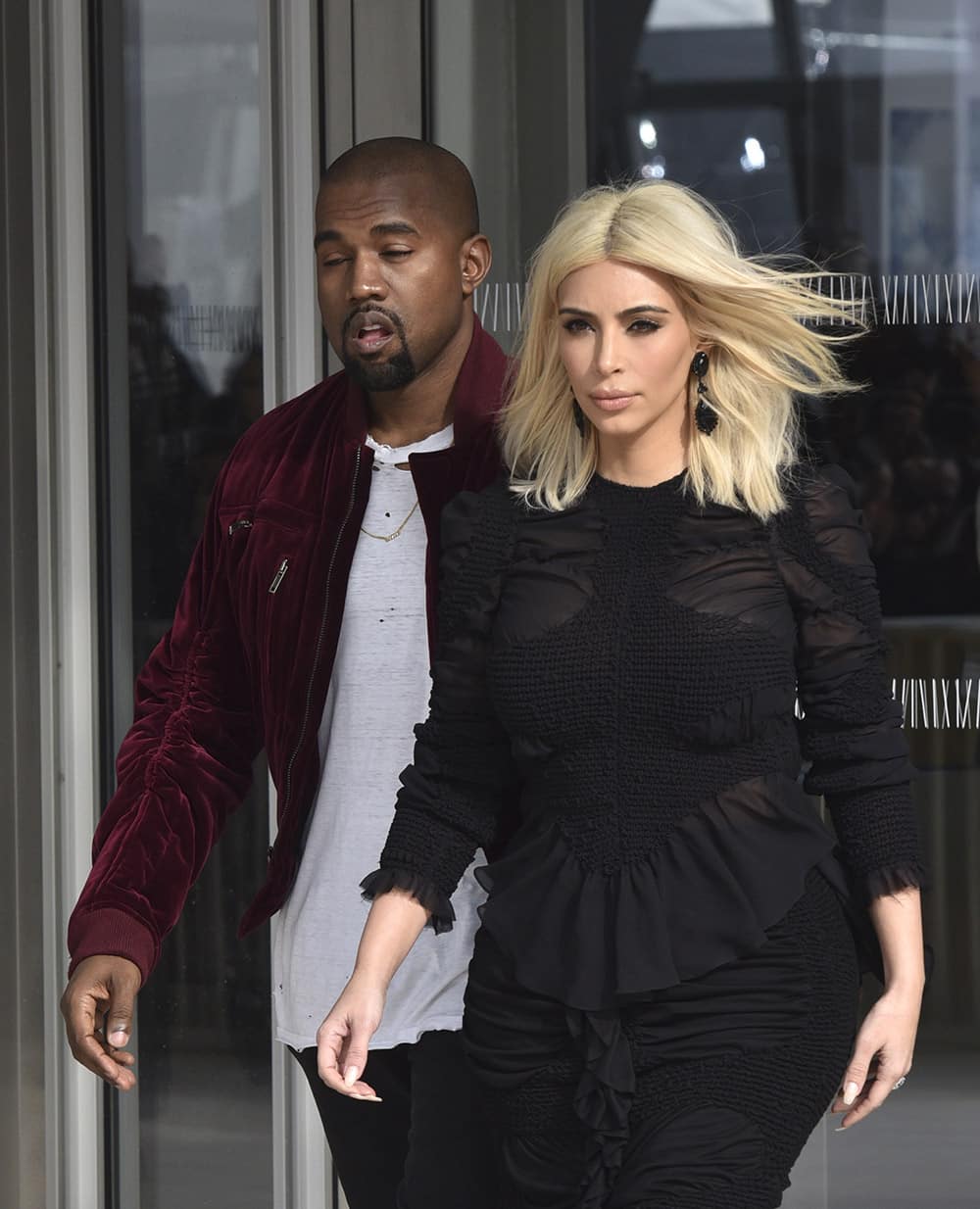 Kim Kardashian and singer Kanye West leave Louis Vuitton's Fall-Winter ready-to-wear fashion collection presented during the Paris Fashion Week in Paris, France.