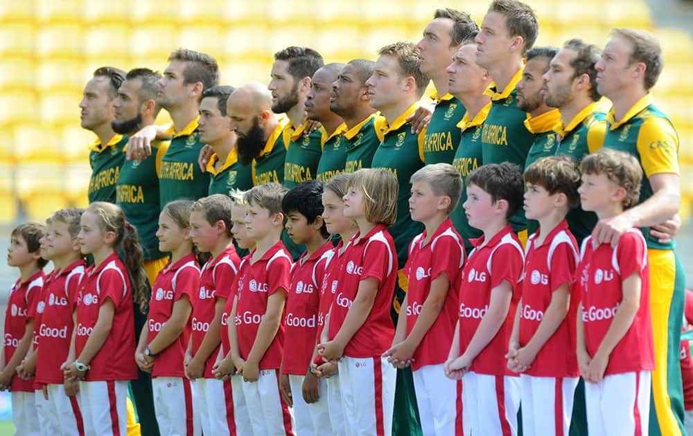 The South African team line up ahead of their Cricket World Cup Pool B match against the United Arab Emirates in Wellington, New Zealand.