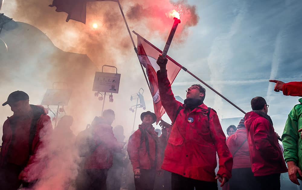 Trade union members protest in Brussels.