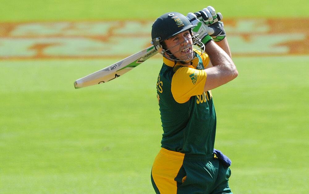 South African batsman A.B de Villiers hits a ball for six runs during their Cricket World Cup Pool B match against the United Arab Emirates in Wellington, New Zealand.