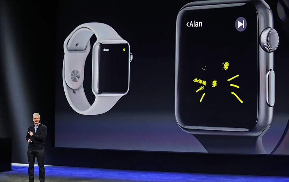 Apple CEO Tim Cook explains the features of the new Apple Watch during an Apple event in San Francisco.