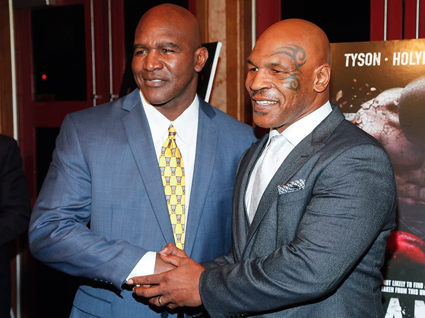 Evander Holyfield and Mike Tyson, attend a special screening of 'Champs' at the Village East Cinema, in New York. 