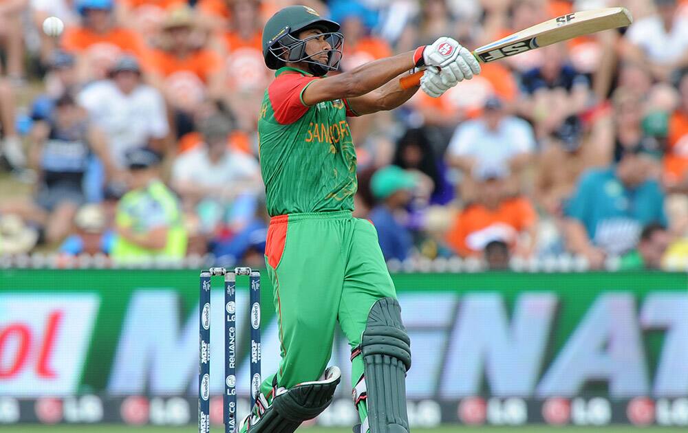 Bangladesh’s Mahmudullah swings at the ball while batting against New Zealand during their Cricket World Cup Pool A match in Hamilton.