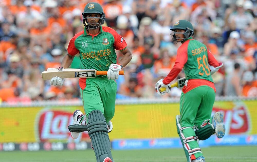 Bangladesh’s Mahmudullah and teammate Sarkar Soumya run between the wickets during their Cricket World Cup Pool A match against New Zealand in Hamilton, New Zealand.