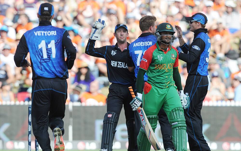 Bangladesh’s Shakib Al Hasan walks from the field after he was dismissed for 23 runs while batting against New Zealand during their Cricket World Cup Pool A match in Hamilton, New Zealand.