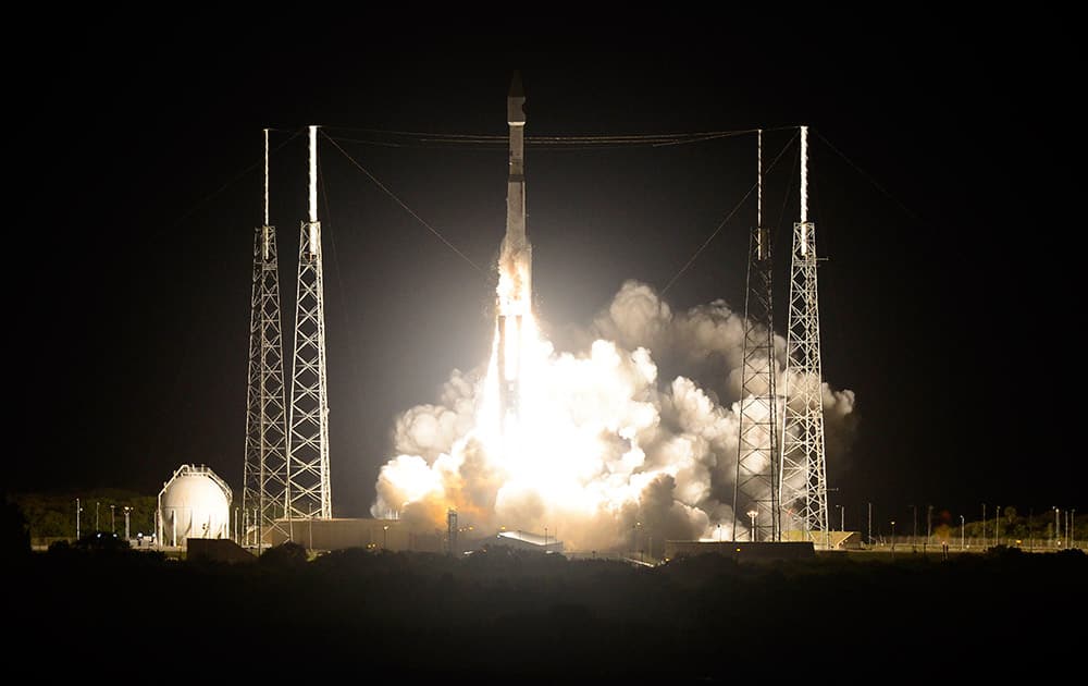 The unmanned Atlas rocket — and NASA's Magnetospheric Multiscale spacecraft lifts off from Cape Canaveral, Fla.