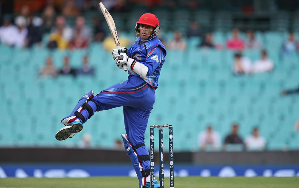 Afghanistan’s Jamal Nasir follows the ball after playing a shot during their Cricket World Cup pool A match against England in Sydney.