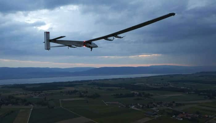 Solar-powered aircraft extends stopover due to bad weather