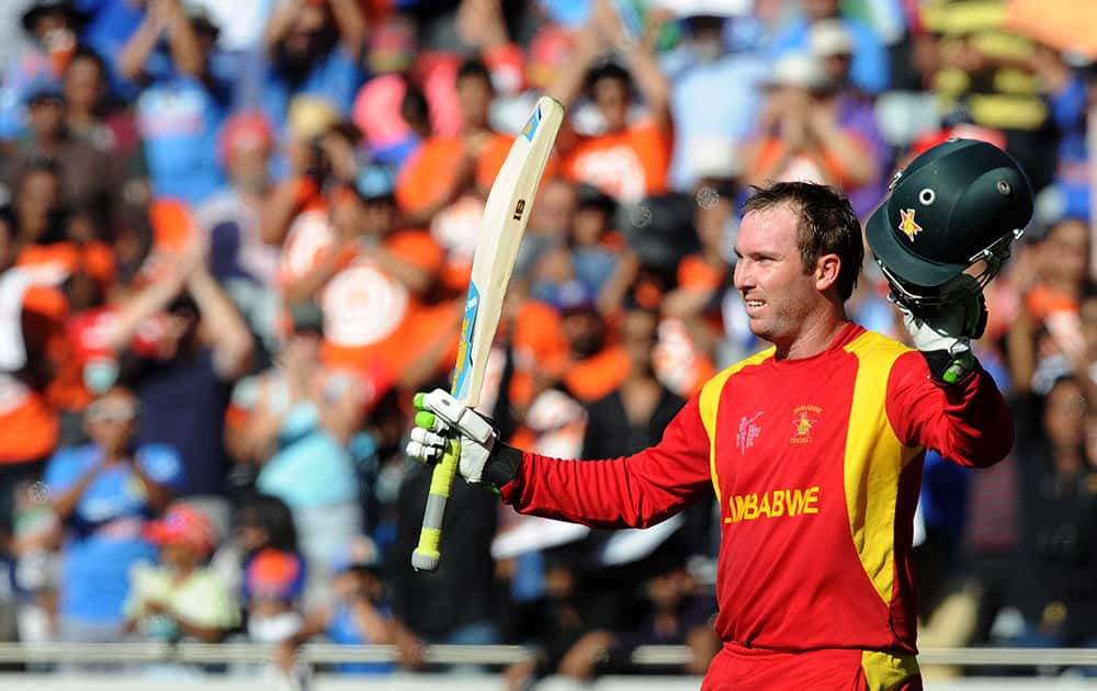 Zimbabwe batsman Brendan Taylor acknowledges the crowd as he leaves the field after he was dismissed for 138 runs during their Cricket World Cup Pool B match against India in Auckland, New Zealand.