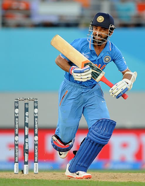 Ajinkya Rahane runs down the wicket while batting against Zimbabwe during their Cricket World Cup Pool B match in Auckland, New Zealand.