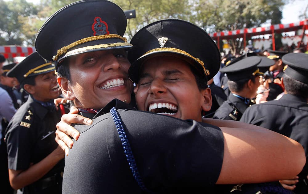 Women cadets celebrate after their graduation ceremony at the Officers Training Academy in Chennai.