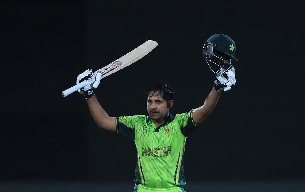 Pakistan’s Sarfraz Ahmed, celebrates his hundred runs during their Cricket World Cup Pool B match against Ireland in Adelaide, Australia.