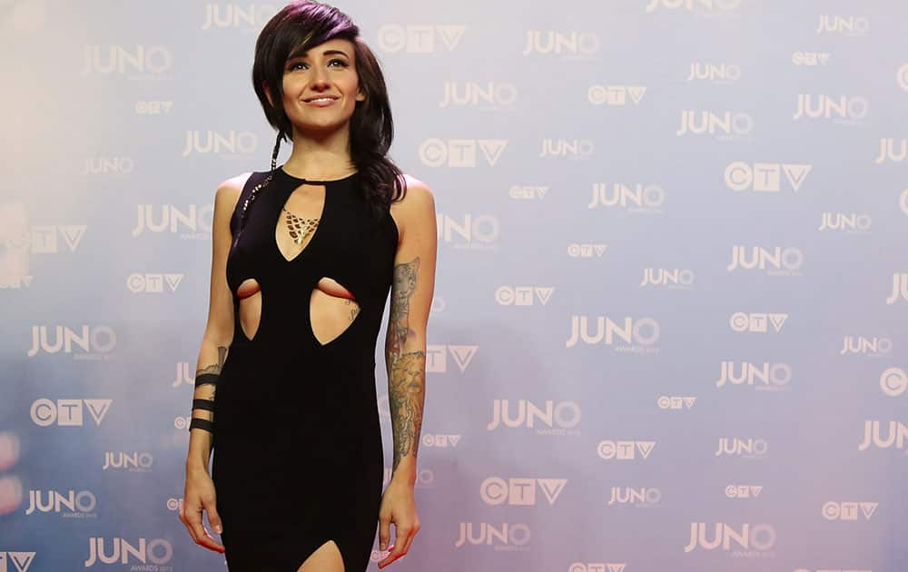 Lights poses on the red carpet during the 2015 Juno Awards in Hamilton, Ont.