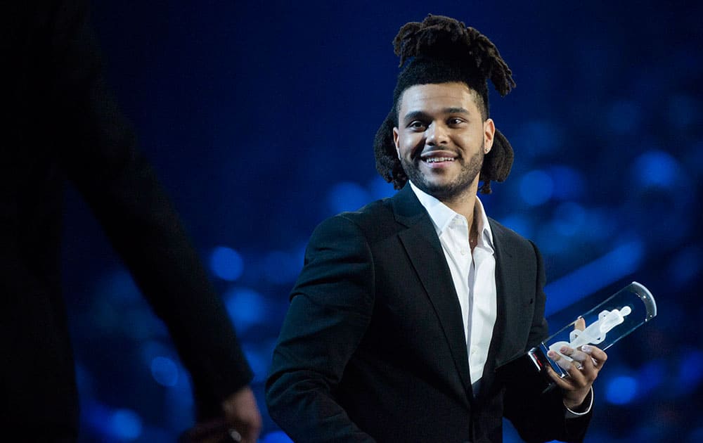 The Weeknd receives the Juno for Artist of the Year during the 2015 Juno Awards in Hamilton, Ont.