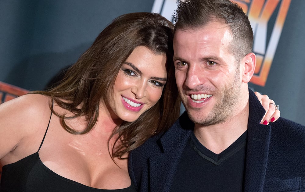 Soccer player Rafael van der Vaart and his girlfriend Sabia Boulahrouz arrive for the premiere of the Queen Musical 'We Will Rock You' in the Mehr! theatre in Hamburg, Germany.