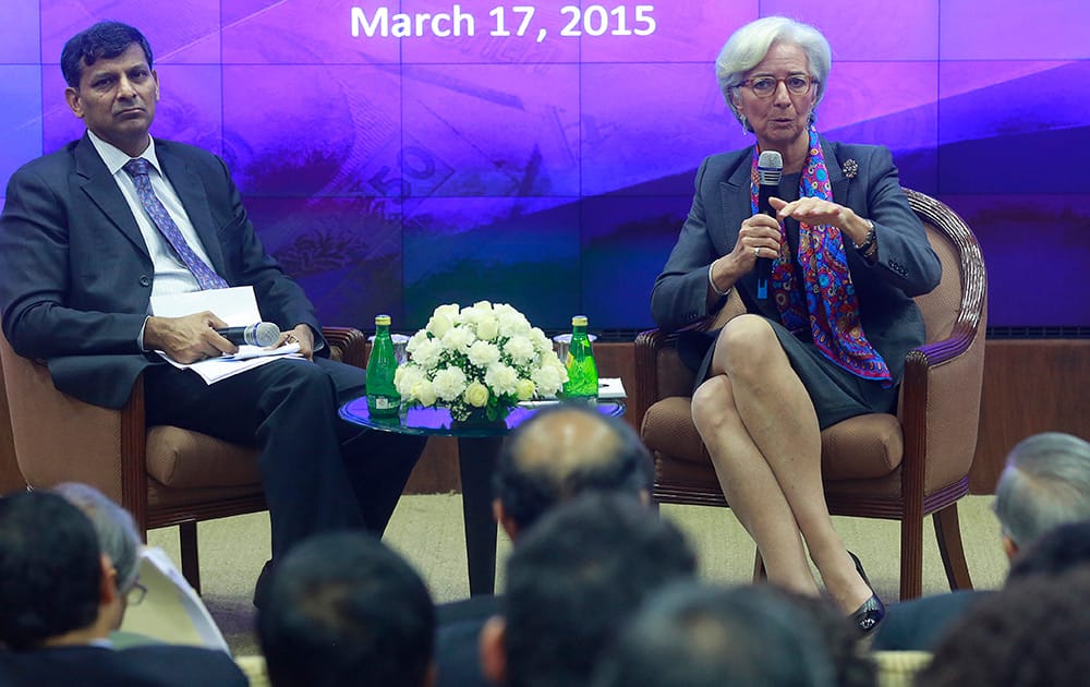 Managing Director of the International Monetary Fund Christine Lagarde speaks as Governor of Reserve Bank of India (RBI) Raghuram Rajan looks on during an event at the RBI headquarters in Mumbai.